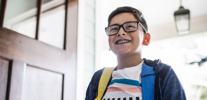 student coming home from school