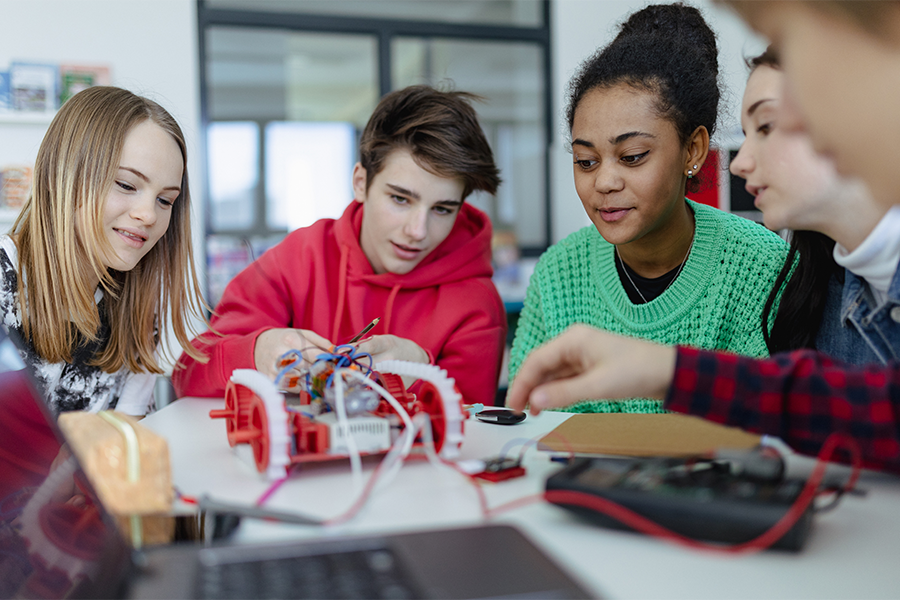A group of students working on a project together